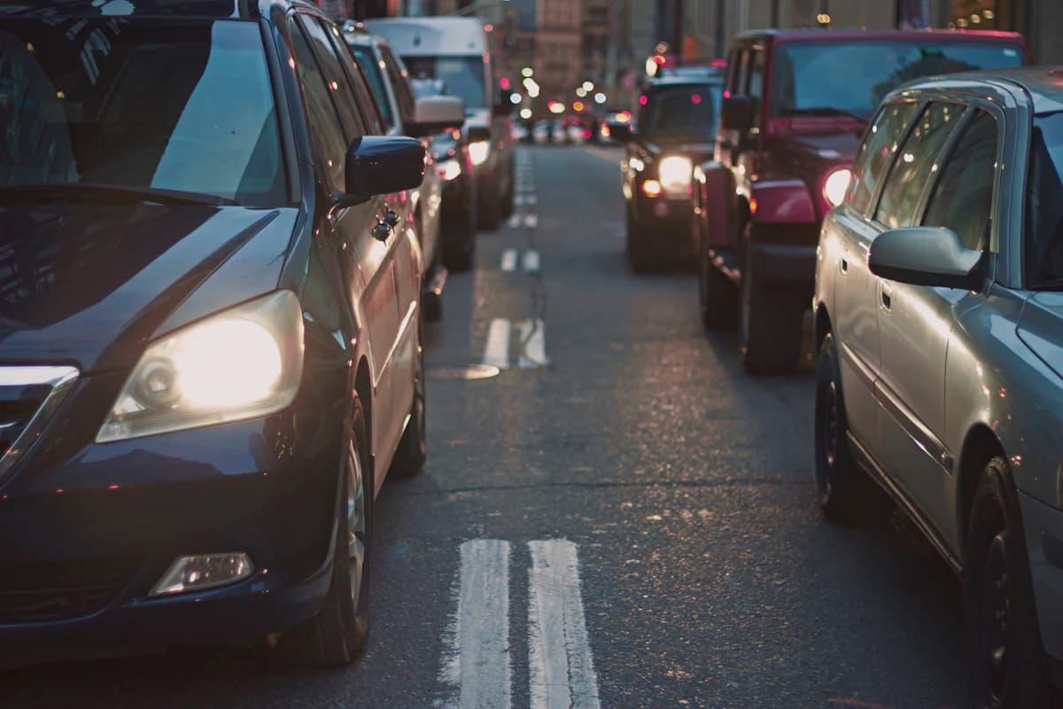 Traffic moving along a multi-lane road.